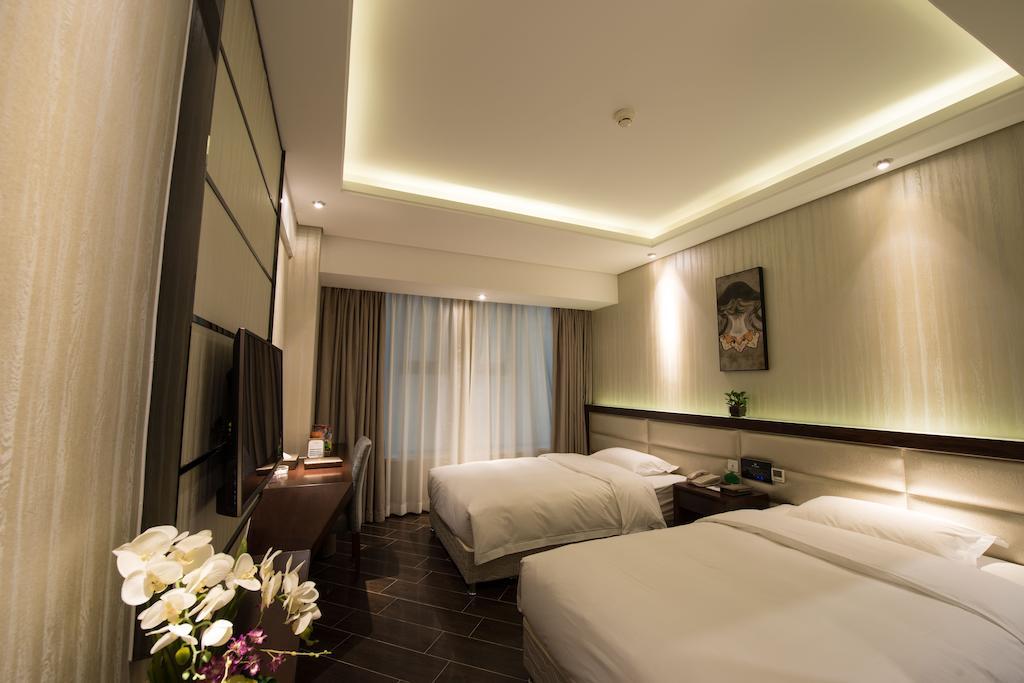 Mianyang Bo Er Ka Hotel Phòng bức ảnh